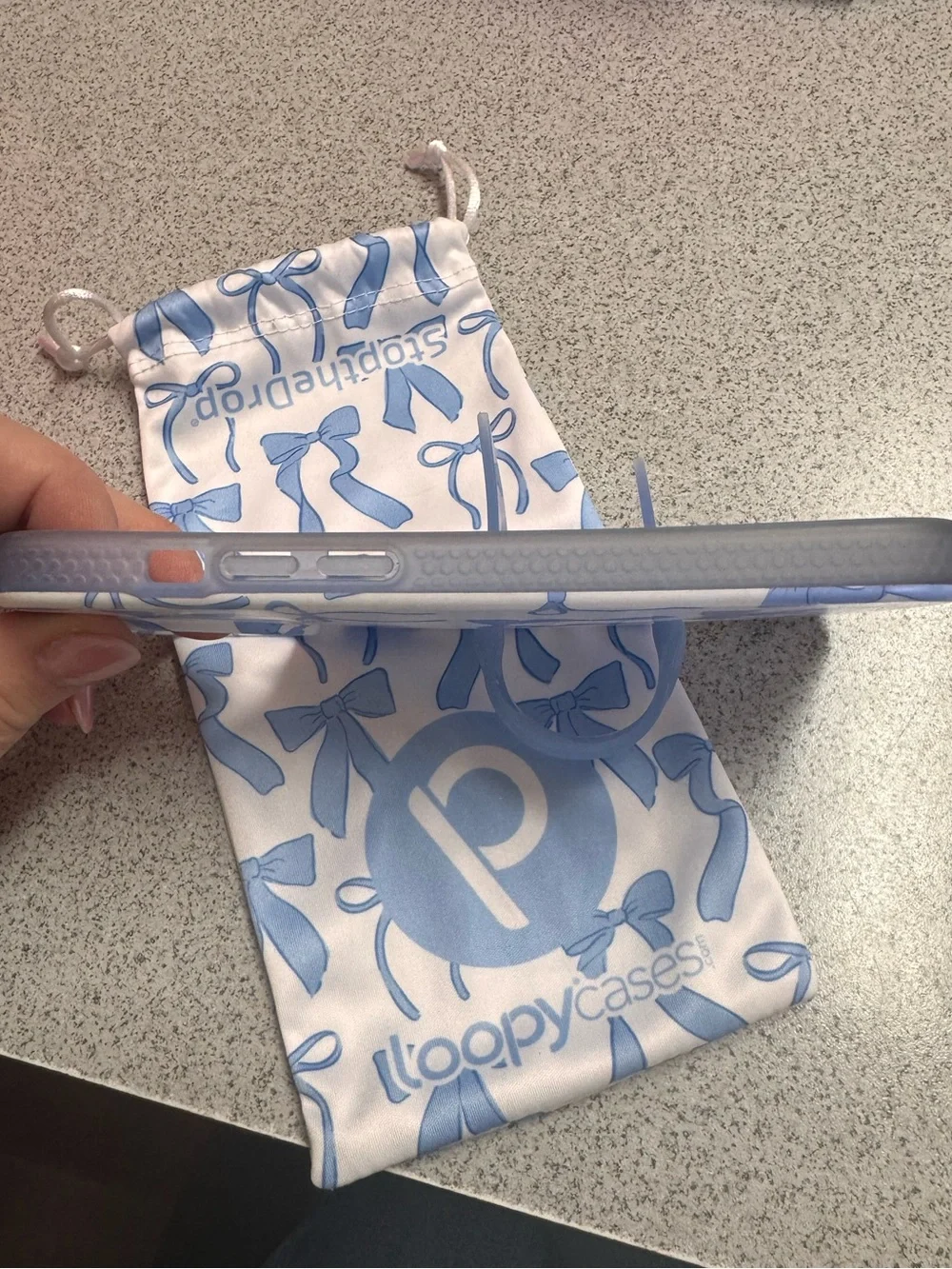 Loopy Case Light Blue Bow for IPhone 15.